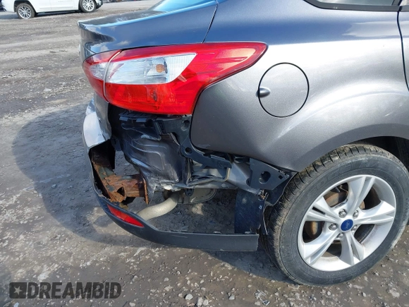 2014 Ford Focus SE with VIN 1FADP3F28EL424707, listed as a IAAI auction lot 42002883 with 115,746 mi miles. Bid and sale history available at carsss.com. Image 6.