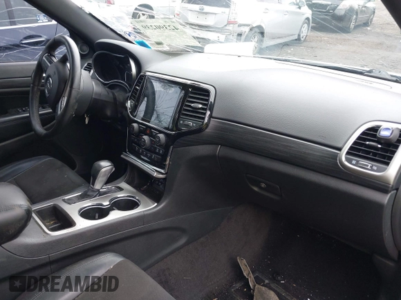 2019 Jeep Grand Cherokee Laredo E with VIN 1C4RJFAG5KC567003, listed as a IAAI auction lot 42390239 with 82,505 mi miles and . Bid and sale history available at DreamBid. Image 5.