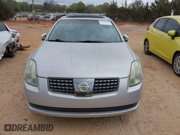 2004 Nissan Maxima SE z VIN 1N4BA41E74C869440, wystawiony jako IAAI lot #41886525 z przebiegiem 130 327 mil mil oraz . Historia ofert i sprzedaży dostępna na DreamBid. Obrazek 6.