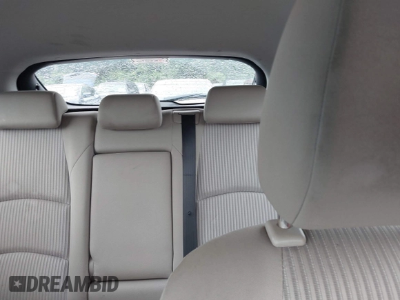 2014 Mazda 3 i Touring z VIN JM1BM1L73E1101014, wystawiony jako IAAI lot #42472127 z przebiegiem 121 426 mil mil oraz . Historia ofert i sprzedaży dostępna na DreamBid. Obrazek 18.