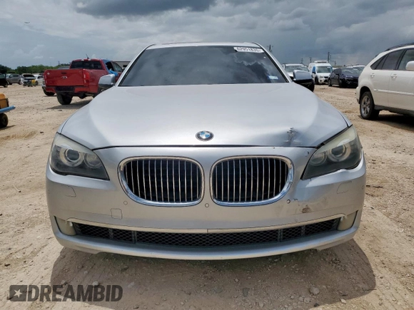 2012 BMW 7 Series 740i with VIN WBAKA4C5XCC613599, listed as a Copart auction lot 62951835 with 102,534 mi miles and Clean title. Bid and sale history available at DreamBid. Image 5.