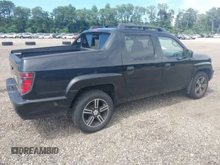 2014 Honda Ridgeline Sport with VIN 5FPYK1F71EB003710, listed as a IAAI auction lot 42777931 with 126,755 mi miles and . Bid and sale history available at DreamBid. Image 4.