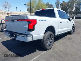 2023 Ford F-150 Lightning Pro with VIN 1FTVW1EV6PWG58783, listed as a IAAI auction lot 41965739 with Not Provided miles and . Bid and sale history available at DreamBid. Image 4.