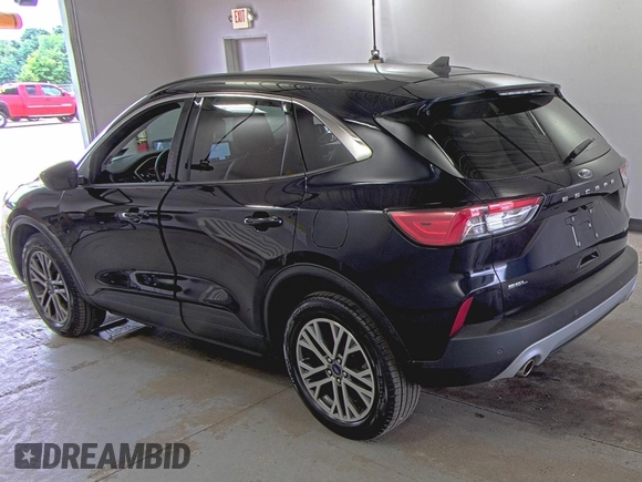 2021 Ford Escape SEL Hybrid with VIN 1FMCU9CZ0MUB25820, listed as a IAAI auction lot 42730204 with 66,443 mi miles and . Bid and sale history available at DreamBid. Image 18.