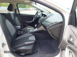 2012 Ford Focus SE with VIN 1FAHP3F2XCL122141, listed as a IAAI auction lot 42008877 with 122,743 mi miles. Bid and sale history available at carsss.com. Image 5.