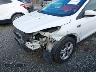 2016 Ford Escape SE z VIN 1FMCU9G96GUC15858, wystawiony jako IAAI lot #41799156 z przebiegiem 162 033 mil mil oraz . Historia ofert i sprzedaży dostępna na DreamBid. Obrazek 6.