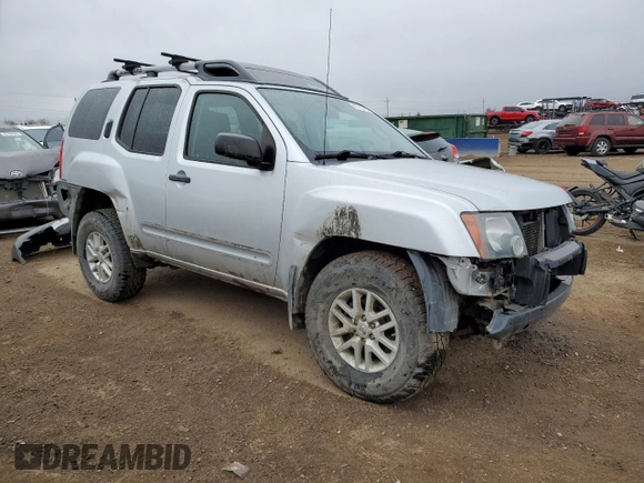 2014 Nissan Xterra X with VIN 5N1AN0NW1EN801139, listed as a Copart auction lot 49270475 with 117,619 mi miles and Salvage Title. Bid and sale history available at DreamBid. Image 4.
