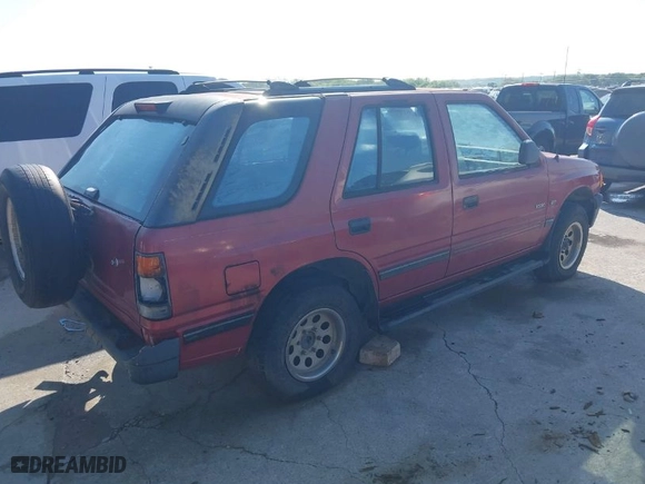 1994 Isuzu Rodeo LS with VIN 4S2CG58VXR4327327, listed as a IAAI auction lot 41959576 with 169,794 mi miles. Bid and sale history available at carsss.com. Image 4.
