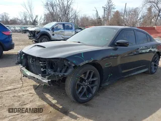 2020 Dodge Charger R/T with VIN 2C3CDXCTXLH145129, listed as a IAAI auction lot 41769766 with 56,213 mi miles and . Bid and sale history available at carsss.com. Image 2.