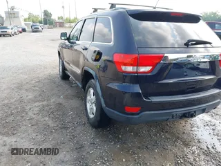 2011 Jeep Grand Cherokee Laredo with VIN 1J4RR4GG5BC622628, listed as a IAAI auction lot 42402893 with 163,731 mi miles and . Bid and sale history available at DreamBid. Image 3.