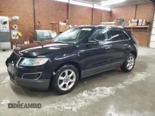 2011 Saab 9-4X z VIN 3G0FNREY1BS800412, wystawiony jako Copart lot #47351285 z przebiegiem 153 928 mil mil oraz Szkoda całkowita • Salvage title. Historia ofert i sprzedaży dostępna na DreamBid. Obrazek 1.