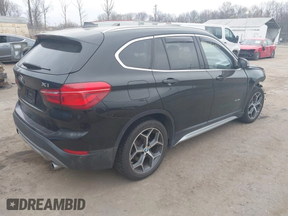 2017 BMW X1 xDrive28i with VIN WBXHT3C31H5F72958, listed as a IAAI auction lot 41782257 with 134,829 mi miles. Bid and sale history available at carsss.com. Image 4.