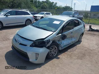 2013 Toyota Prius One z VIN JTDKN3DU3D1647663, wystawiony jako IAAI lot #42301269 z przebiegiem 180 986 mil mil oraz . Historia ofert i sprzedaży dostępna na DreamBid. Obrazek 2.