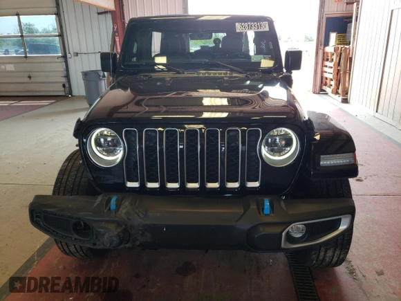 2023 Jeep Wrangler Sahara with VIN 1C4JJXP65PW627241, listed as a Copart auction lot 62873313 with 9,219 mi miles and Clean Title. Bid and sale history available at DreamBid. Image 5.