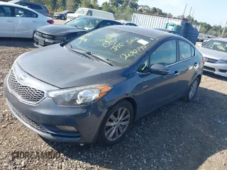 2014 Kia Forte EX with VIN KNAFX4A80E5099170, listed as a IAAI auction lot 40520284 with 172,599 mi miles. Bid and sale history available at carsss.com. Image 2.