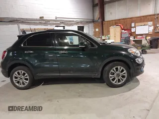 2016 FIAT 500X Lounge with VIN ZFBCFYDT1GP470721, listed as a IAAI auction lot 41293223 with 104,478 mi miles and . Bid and sale history available at DreamBid. Image 13.