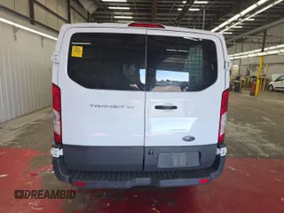 2016 Ford Transit Cargo z VIN 1FTYE1YM1GKB15643, wystawiony jako IAAI lot #42585640 z przebiegiem 301 257 mil mil oraz . Historia ofert i sprzedaży dostępna na DreamBid. Obrazek 33.