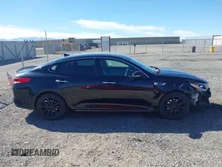 2016 Kia Optima LX with VIN 5XXGT4L32GG108695, listed as a IAAI auction lot 41647970 with 125,319 mi miles. Bid and sale history available at carsss.com. Image 13.