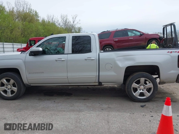 2016 Chevrolet Silverado 1500 LT with VIN 1GCVKREC1GZ228201, listed as a IAAI auction lot 42136420 with 112,101 mi miles and . Bid and sale history available at DreamBid. Image 14.