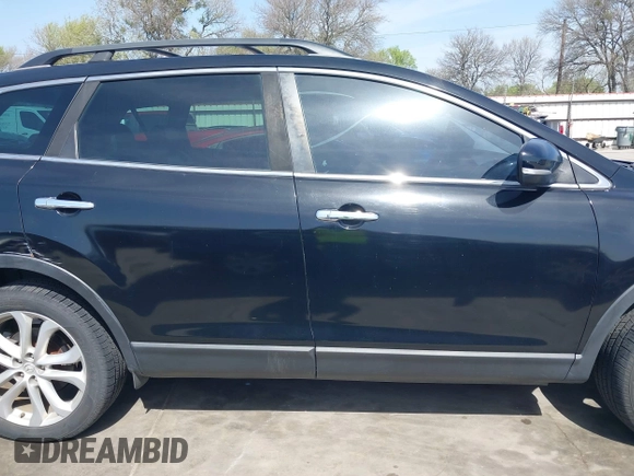 2011 Mazda CX-9 Grand Touring with VIN JM3TB3DA5B0300784, listed as a IAAI auction lot 41816110 with 138,523 mi miles and . Bid and sale history available at DreamBid. Image 14.