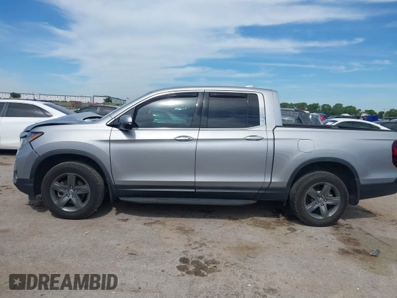 2021 Honda Ridgeline RTL-E с VIN 5FPYK3F70MB025806, выставлен на аукционе IAAI как лот 42311667 с пробегом 30 143 миль миль и . История ставок и продаж доступна на DreamBid. Изображение 14.