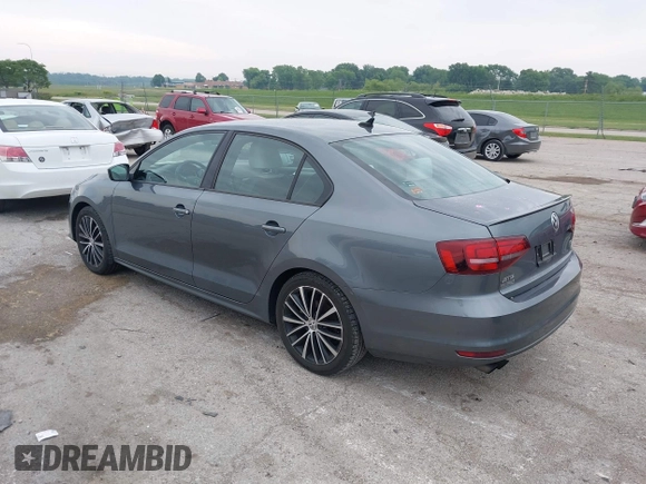 2016 Volkswagen Jetta Sport z VIN 3VWD17AJ8GM292211, wystawiony jako IAAI lot #42371317 z przebiegiem 142 360 mil mil oraz . Historia ofert i sprzedaży dostępna na DreamBid. Obrazek 3.