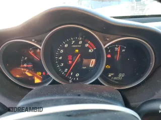 2004 Mazda RX-8 with VIN JM1FE173240116713, listed as a Copart auction lot 87615985 with 118,093 mi miles and Salvage Title. Bid and sale history available at carsss.com. Image 9.