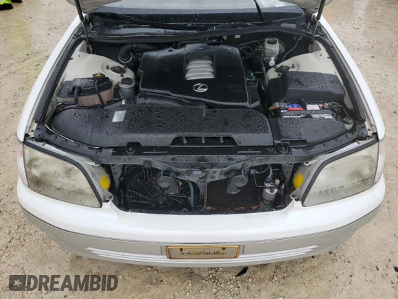 2000 Lexus LS 400 z VIN JT8BH28FXY0178613, wystawiony jako Copart lot #74883444 z przebiegiem Nie podano mil oraz Szkoda całkowita • Salvage title. Historia ofert i sprzedaży dostępna na DreamBid. Obrazek 11.