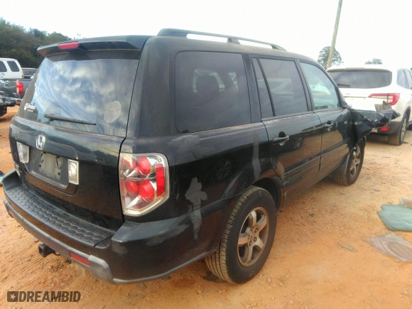 2006 Honda Pilot EX-L with RES with VIN 5FNYF28616B019530, listed as a IAAI auction lot 40564911 with 258,610 mi miles. Bid and sale history available at carsss.com. Image 4.