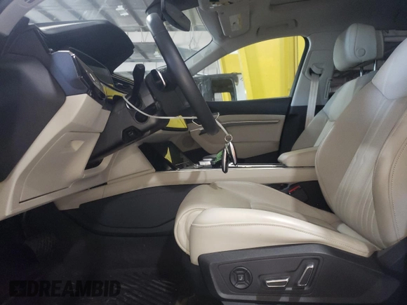 2021 Audi e-tron Prestige with VIN WA1VABGEXMB001869, listed as a Copart auction lot 52728573 with 26,110 mi miles and . Bid and sale history available at DreamBid. Image 7.