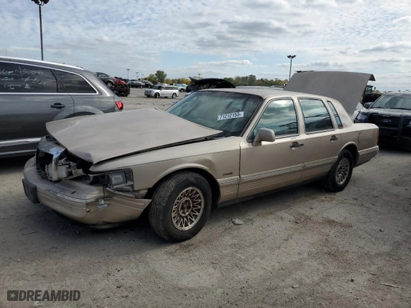 1997 Lincoln Town Car Executive with VIN 1LNLM81W4VY740724, listed as a Copart auction lot 71212153 with 251,543 mi miles and Salvage Title. Bid and sale history available at carsss.com. Image 1.