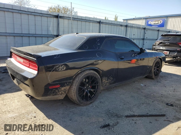 2014 Dodge Challenger R/T z VIN 2C3CDYBT2EH165224, wystawiony jako Copart lot #48183855 z przebiegiem 139 037 mil mil oraz Szkoda całkowita • Salvage title. Historia ofert i sprzedaży dostępna na DreamBid. Obrazek 3.