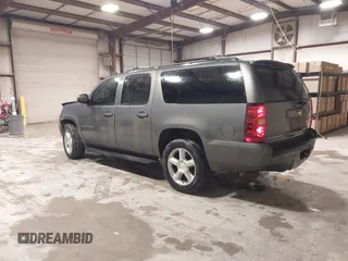 2011 Chevrolet Suburban LT with VIN 1GNSCJE0XBR180270, listed as a IAAI auction lot 41531193 with 202,493 mi miles. Bid and sale history available at carsss.com. Image 3.