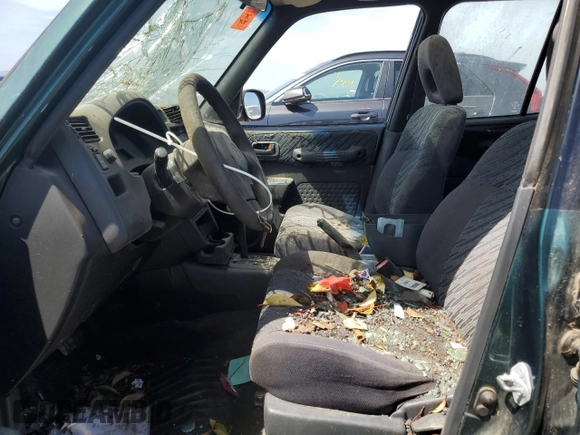 1999 Toyota RAV4 with VIN JT3GP10V9X7044726, listed as a Copart auction lot 55180935 with 196,509 mi miles and Salvage Title. Bid and sale history available at DreamBid. Image 7.
