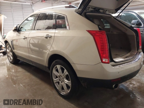 2015 Cadillac SRX Premium Collection with VIN 3GYFNDE32FS623153, listed as a IAAI auction lot 41577809 with 149,932 mi miles. Bid and sale history available at carsss.com. Image 3.
