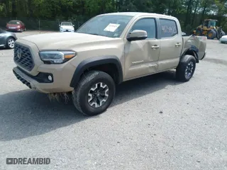 2020 Toyota Tacoma 4WD SR5 with VIN 3TMCZ5AN2LM356140, listed as a IAAI auction lot 41751425 with 80,671 mi miles. Bid and sale history available at carsss.com. Image 2.