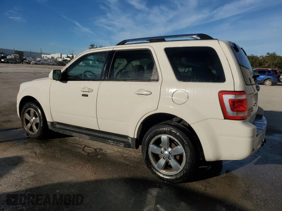 2011 Ford Escape Limited with VIN 1FMCU9EG0BKB89084, listed as a Copart auction lot 87066594 with 112,625 mi miles and Salvage Title. Bid and sale history available at DreamBid. Image 2.