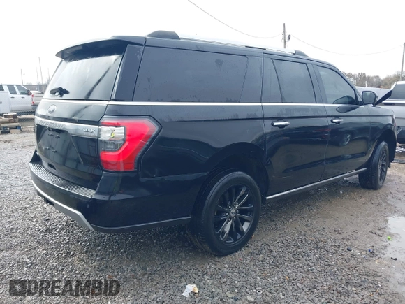 2019 Ford Expedition Max Limited z VIN 1FMJK2AT3KEA17802, wystawiony jako IAAI lot #41386086 z przebiegiem 185 541 mil mil oraz . Historia ofert i sprzedaży dostępna na DreamBid. Obrazek 4.