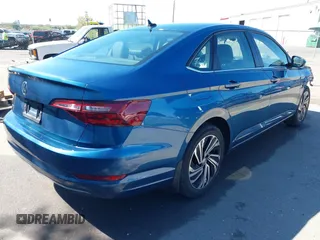 2021 Volkswagen Jetta SEL with VIN 3VWE57BUXMM050386, listed as a IAAI auction lot 42140492 with 74,477 mi miles and . Bid and sale history available at DreamBid. Image 4.