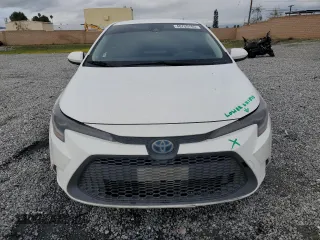 2021 Toyota Corolla Hybrid LE with VIN JTDEAMDE3MJ013373, listed as a Copart auction lot 48709785 with 136,422 mi miles and Salvage Title. Bid and sale history available at carsss.com. Image 5.