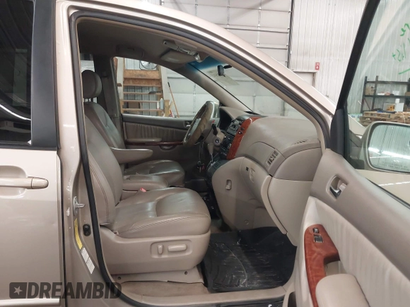 2005 Toyota Sienna XLE with VIN 5TDBA22C85S047371, listed as a IAAI auction lot 41591534 with 185,209 mi miles and . Bid and sale history available at DreamBid. Image 5.