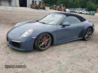 2018 Porsche 911 Carrera S with VIN WP0CB2A94JS147332, listed as a Copart auction lot 62698215 with 54,427 mi miles and Salvage title. Bid and sale history available at DreamBid. Image 1.