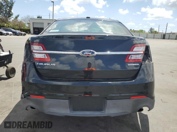 2015 Ford Taurus SE with VIN 1FAHP2D86FG140750, listed as a Copart auction lot 54390145 with 128,163 mi miles and Salvage Title. Bid and sale history available at carsss.com. Image 6.