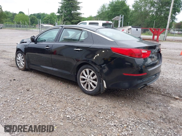 2014 Kia Optima EX z VIN 5XXGN4A77EG330968, wystawiony jako IAAI lot #42209541 z przebiegiem 106 888 mil mil oraz . Historia ofert i sprzedaży dostępna na DreamBid. Obrazek 3.