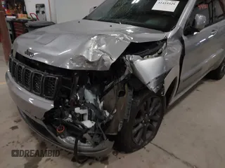 2018 Jeep Grand Cherokee High Altitude with VIN 1C4RJFCGXJC502580, listed as a IAAI auction lot 41419329 with 90,713 mi miles. Bid and sale history available at carsss.com. Image 6.