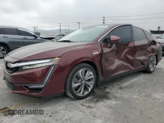 2018 Honda Clarity Touring z VIN JHMZC5F32JC013215, wystawiony jako Copart lot #56943735 z przebiegiem 171 186 mil mil oraz Szkoda całkowita • Salvage title. Historia ofert i sprzedaży dostępna na DreamBid. Obrazek 1.