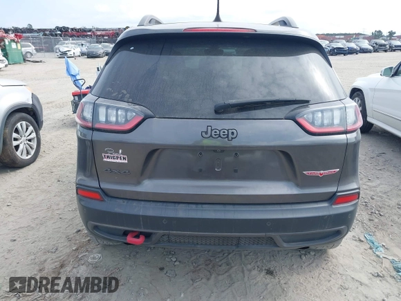 2019 Jeep Cherokee Trailhawk z VIN 1C4PJMBX1KD314121, wystawiony jako IAAI lot #42106721 z przebiegiem 105 631 mil mil oraz . Historia ofert i sprzedaży dostępna na DreamBid. Obrazek 16.
