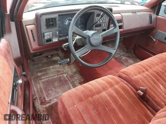 1990 GMC Sierra 1500 z VIN 1GTFC24K8LE514419, wystawiony jako Copart lot #57265335 z przebiegiem 162 045 mil mil oraz Szkoda całkowita • Salvage title. Historia ofert i sprzedaży dostępna na DreamBid. Obrazek 8.