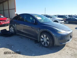 2023 Tesla Model Y Long Range with VIN 7SAYGAEE8PF667728, listed as a IAAI auction lot 41839771 with 32,654 mi miles and . Bid and sale history available at DreamBid. Image 1.