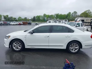 2016 Volkswagen Passat S with VIN 1VWAT7A38GC056495, listed as a IAAI auction lot 41965717 with 163,254 mi miles and . Bid and sale history available at DreamBid. Image 14.